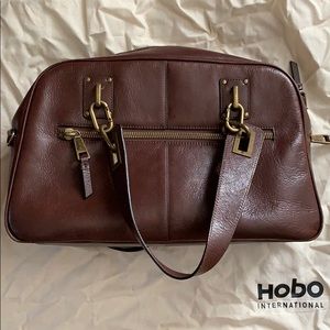 HOBO leather satchel with brass hardware
